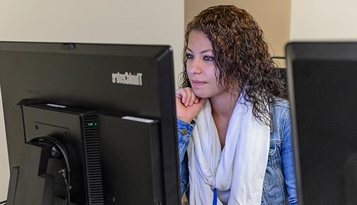 Students taking tests on computers